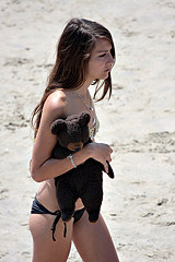 Sexy bikini teen with teddy bear